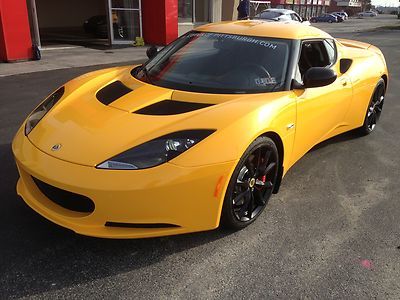 New,evora s 2+2, solar yellow,factory warranty,79 miles,we finance, supercharged