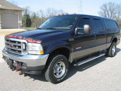 One owner!  2004 ford f-250 super duty lariat 4x4 6.0 turbo diesel with plow