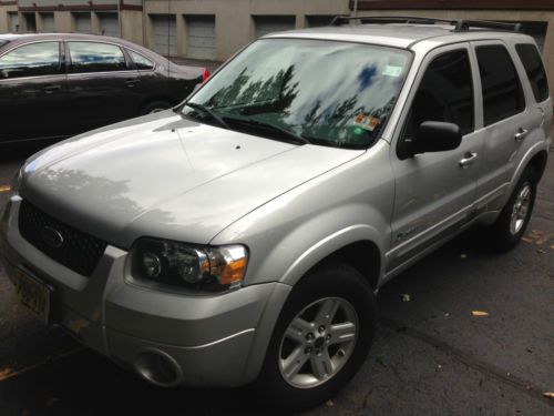 2005 hybrid ford escape w nav &amp; brand new engine with 2 more years of warranty