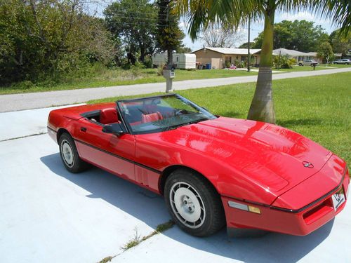 1986 corvette convertible, red w/new black top, new tires, 114,000 miles