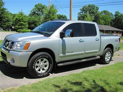2005 nissan titan le crew cab 4x4...tv/dvd...all options...the right 1...hot !!!