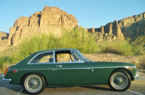 You must see this beautiful low mile, rust free british raceing green mgb gt.