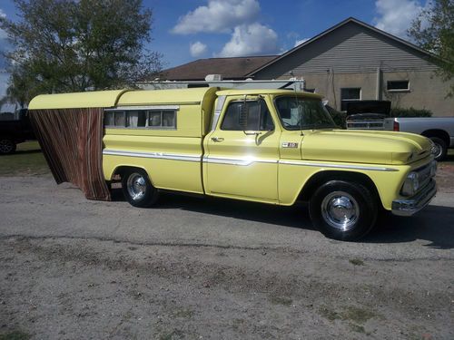 1964 chevrolet c-10 custom with a pullman camper. v-8 and a 3 speed