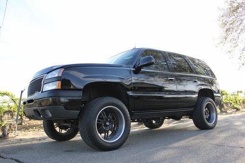 Lifted gmc yukon / tahoe, custom front end, skyjacker, rushforth billet wheels