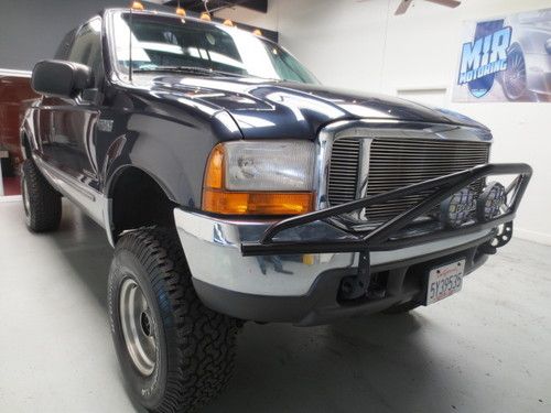 1999 ford f-250 4x4 diesel 7.3l lifted 34inch tires 5inch lift kit