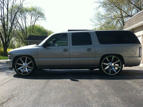2000 chevy burban w/ 25,000 watts, airride, 26's and much more