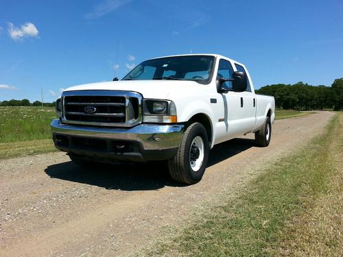 2004 ford f-350 xl crew cab 102,000 miles 17k on new engine power stroke diesel