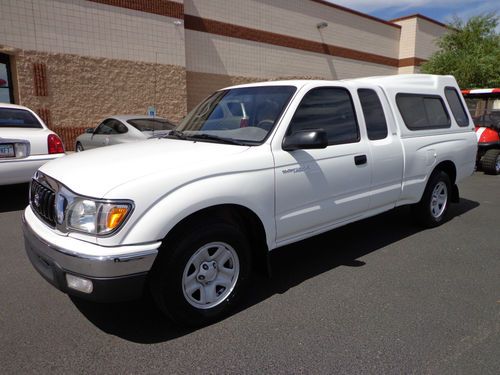 2004 toyota tacoma extended cab pickup w/ camper