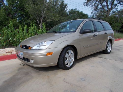 2002 ford focus ztw wagon 4-door 2.0l, gold, leather interior, excellent cond.