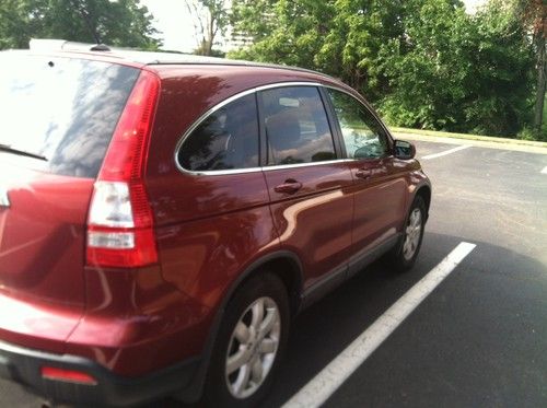 2009 honda cr-v ex-l sport utility 4-door 2.4l awd -red exterior / gray interior