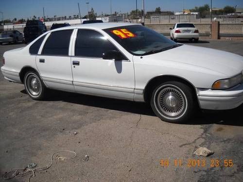 New motor!! 1995 white chevy caprice 5.7 - $995 (auction.cars.imports llc