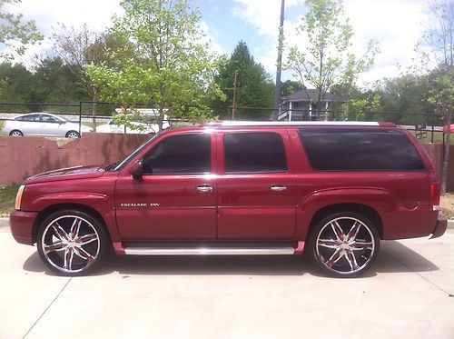 2004 cadillac escalade esv with $5000 custom stereo &amp; tv,s and sitting on 26,s