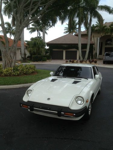 "time capsule".  32456 miles.  280 zx 2+2.  5 speed.  white/red