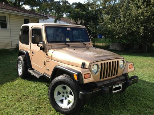 1999 jeep wrangler sport. 4.0 liter 5 speed hard top cold a/c