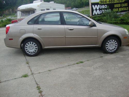 2004 suzuki forenza s sedan 4-door 2.0l