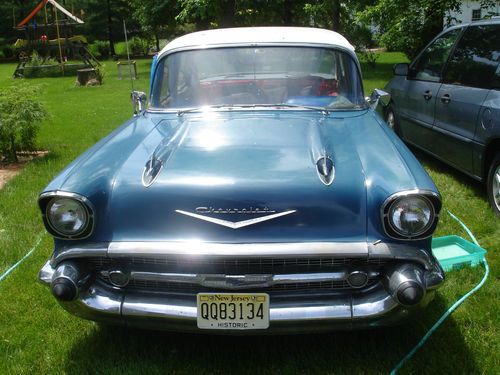 All original chrome removed from my 57 chevy 210 4 door