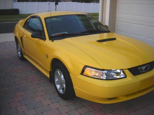 1999 canary yellow ford mustang