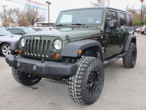 3.8l v6 5-speed manual 4x4 18in black rims 35in off road tires power equipment