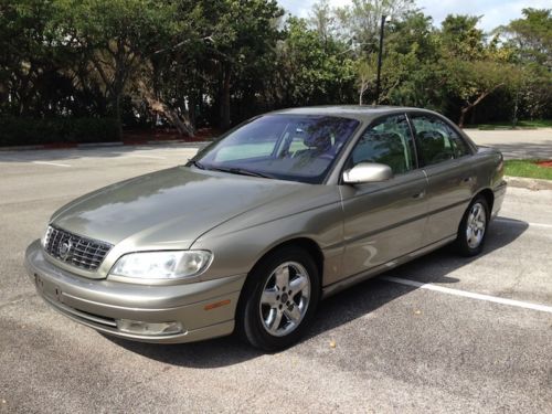 Low miles clean carfax garage kept fl well maintained sunroof chrome wheels bose