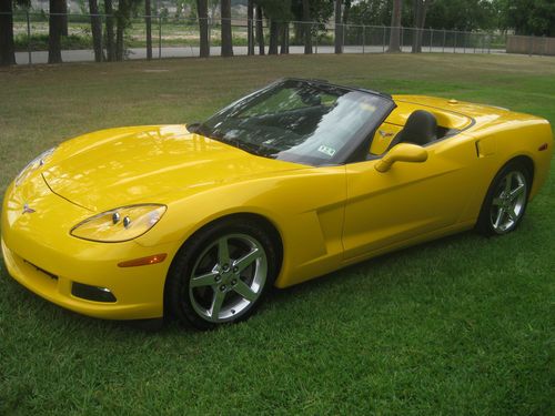 2005 corvette convertible, super low miles (13k), 6 speed, yellow w black int.