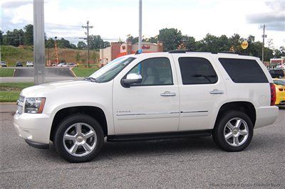 Save at empire chevy on this new white diamond and cashmere ltz 4x4 with sunroof