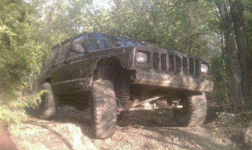 Lifted jeep cherokee 4x4 bed lined