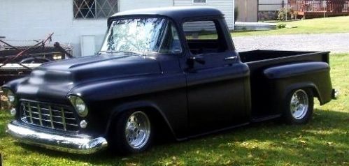 Flat black 1957 chevy pickup, stepside