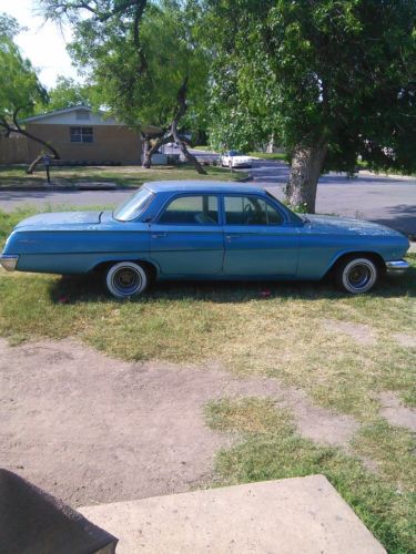 Light blue 4 door chevy biscayne