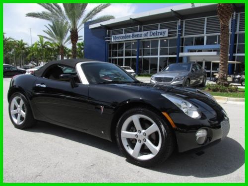 06 black solstice 2.4l i4 manual:5-speed convertible *two tone leather seats *fl