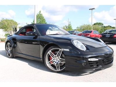 Turbo convertible  black over red carbon package call greg 727-698-5544