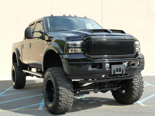 ~~03~ford~f-350~crew~sport~leather~monster~modified~lifted~diesel~no~reserve~~