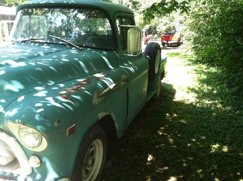 1957 chevy 1/2 ton step side long bed pick up truck
