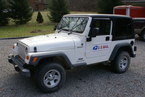 2006 jeep wrangler sport 4x4 right hand drive, white with black hardtop.
