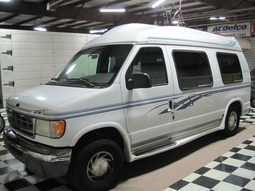 1997 ford e 150 wheelchair van with a braun lift. raised roof, full conversion