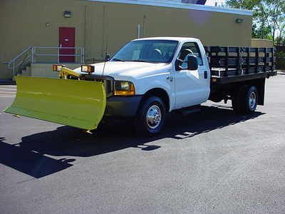 4 wheel drive / snow plow / only 60k miles / 12ft stake bed / dually