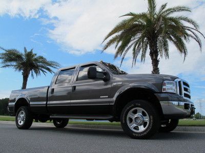 Ford f350 super crew cab 4x4 fx4 lariat powerstroke diesel studded deleted clean