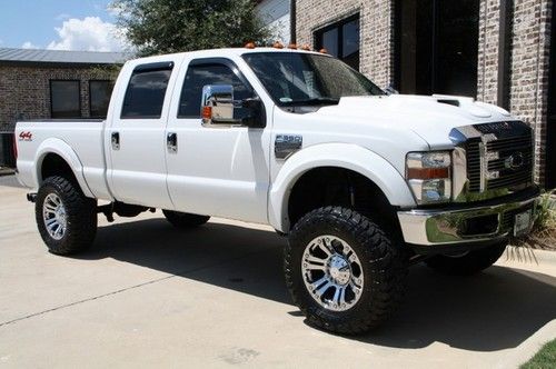 Lariat,6.4l turbo diesel,8-inch lift,37's,hard loaded! rated a 9+! must read!