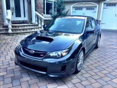 Sti , very low miles , mint condition, exhaust , intake