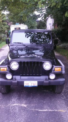2002 jeep wrangler 6cyl 4.0l with hard top &amp; soft top