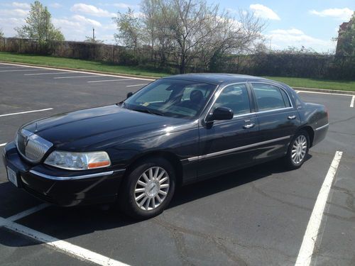 Black on black lincoln town car ready for work