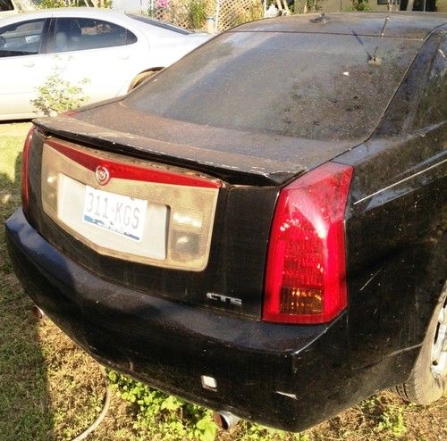 2004 cadillac cts base sedan 4-door 3.6l  ** wrecked with salvage title ** as is