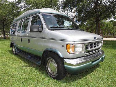 Florida hi top luxury conversion van captains chairs leather sofa bed tv so nice