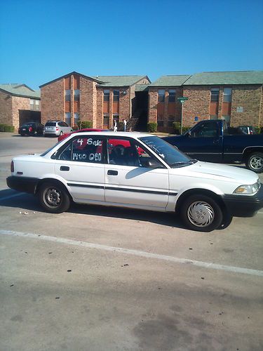 White 1991 toyota corolla 4 door