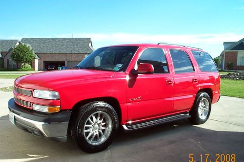 2001 mallett tahoe, red with tan leather interior. built by mallett cars ltd