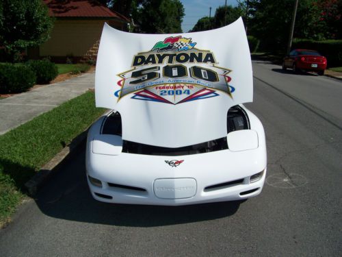 2004 corvette convertible, white &amp; white top, polished  wheels 8,100 milesthere