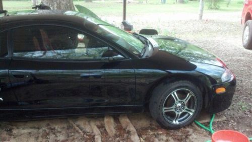 1998 mitsubishi eclipse black, 2 racing cams in the engine, very well maintained