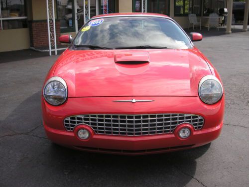 Look 2004 ford thunderbird  two owner car  !