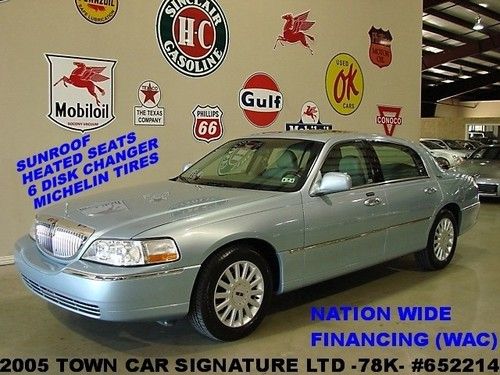05 town car signature limited,sunroof,htd lth,6 disk cd,17in whls,78k,we finance