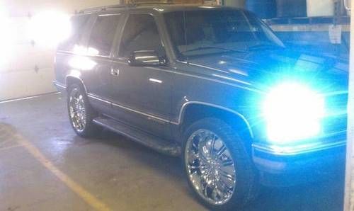 1999 chevrolet tahoe lt with 24" chrome rims and plenty of extras
