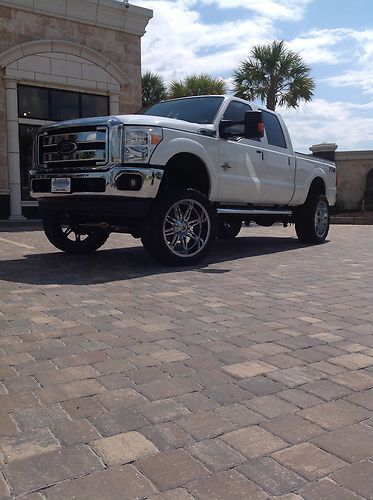 Lifted 2012 ford f-250 lariat crew cab loaded with mods. excellent condition!